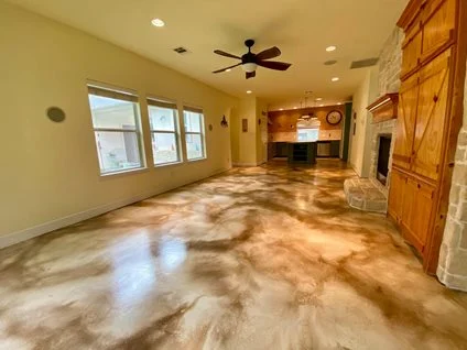 Stone-effect stained concrete living room floor